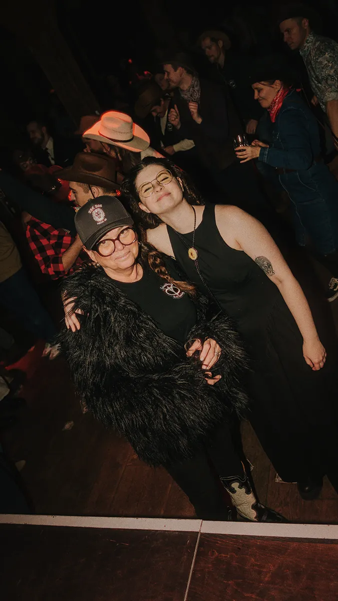 two freiheit.com members enjoy their time together at the xmas party 2025