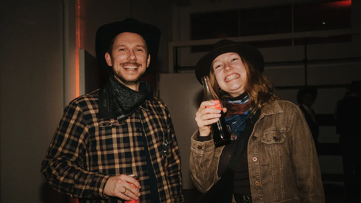 two freiheit.com member enjoy their time at the xmas party